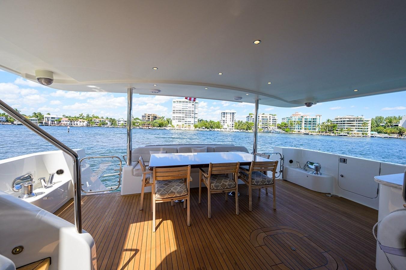 a room with a table and chairs aboard ROBINSON CRUSOE Yacht for Sale