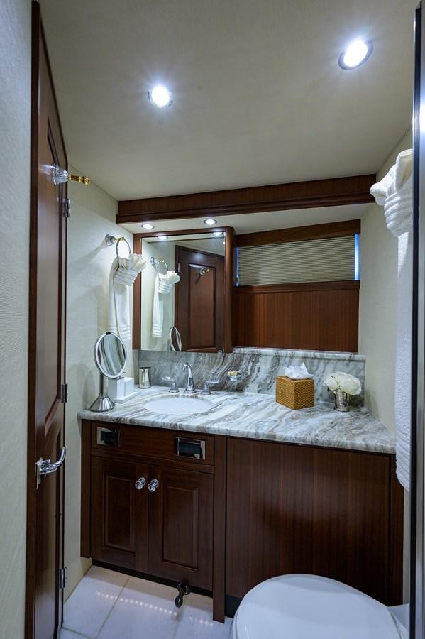 a bathroom with a sink and a mirror aboard ROBINSON CRUSOE Yacht for Sale