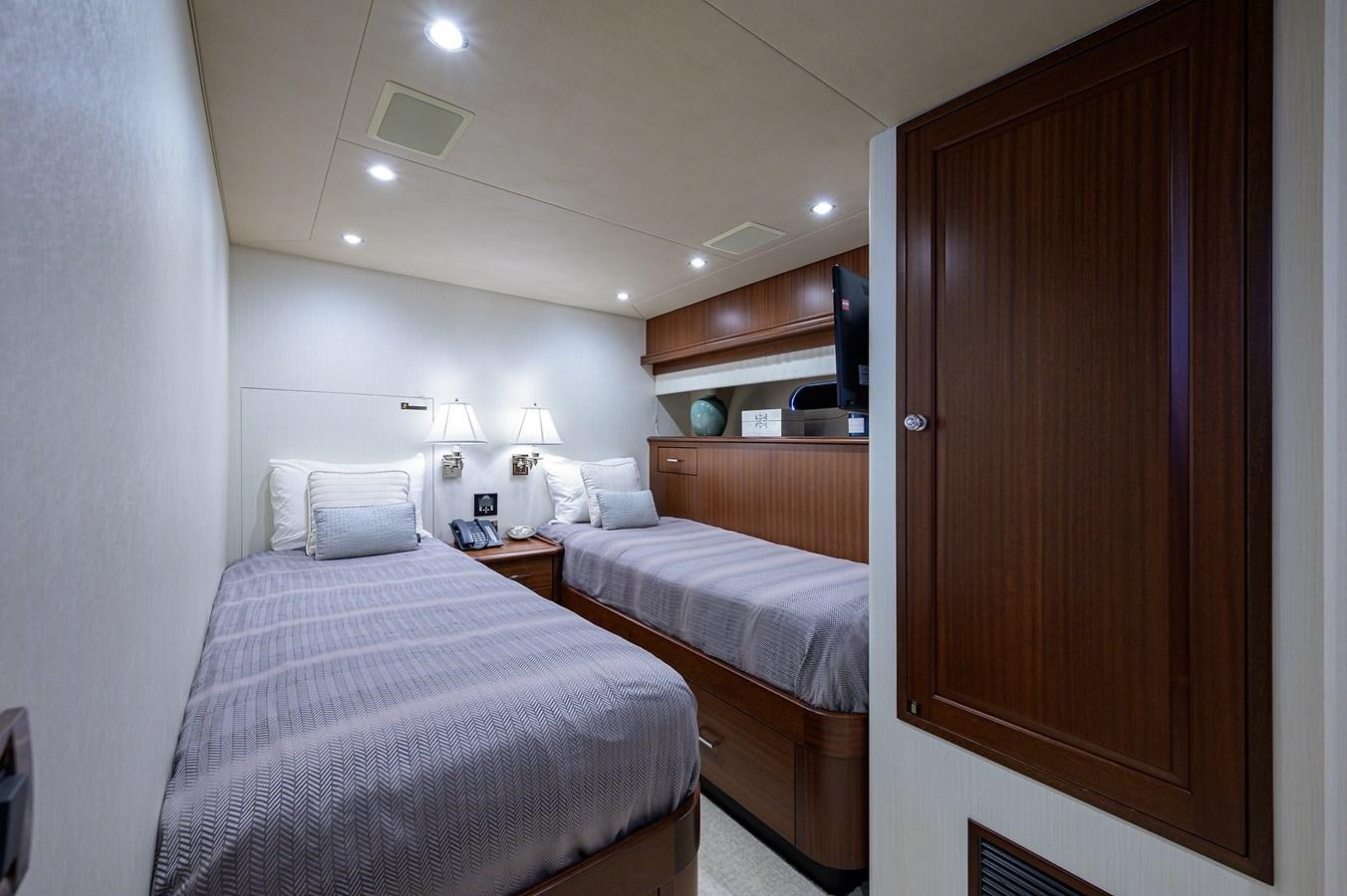 a room with two beds aboard ROBINSON CRUSOE Yacht for Sale