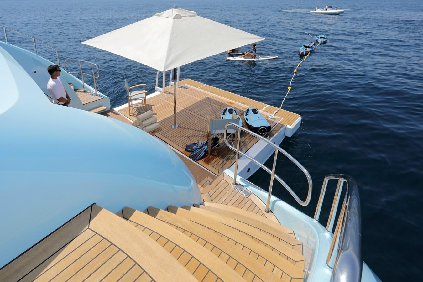 a boat with a person sitting on it aboard AWATEA Yacht for Sale
