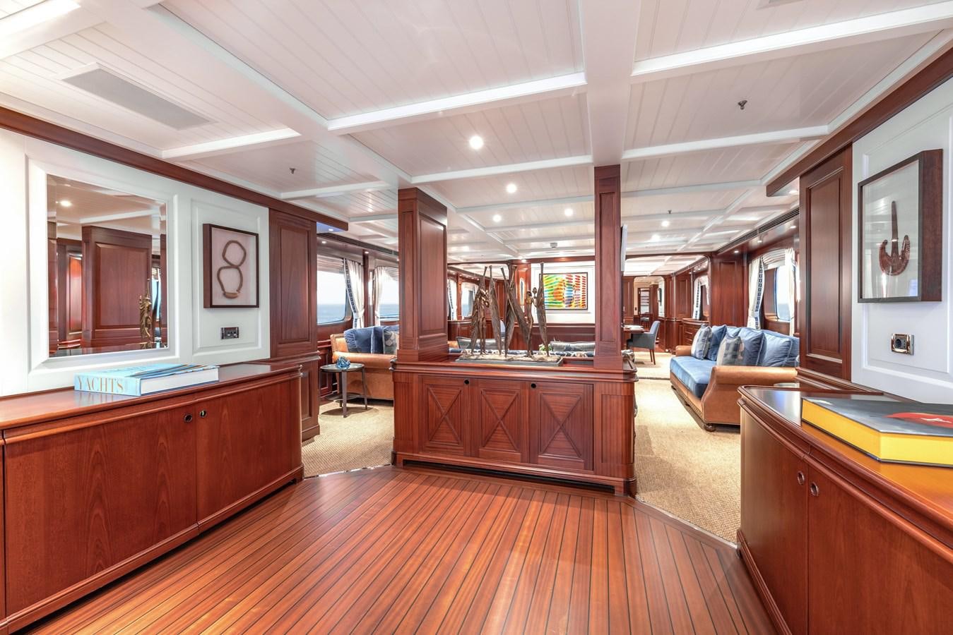 a large kitchen with a wood floor aboard AWATEA Yacht for Sale