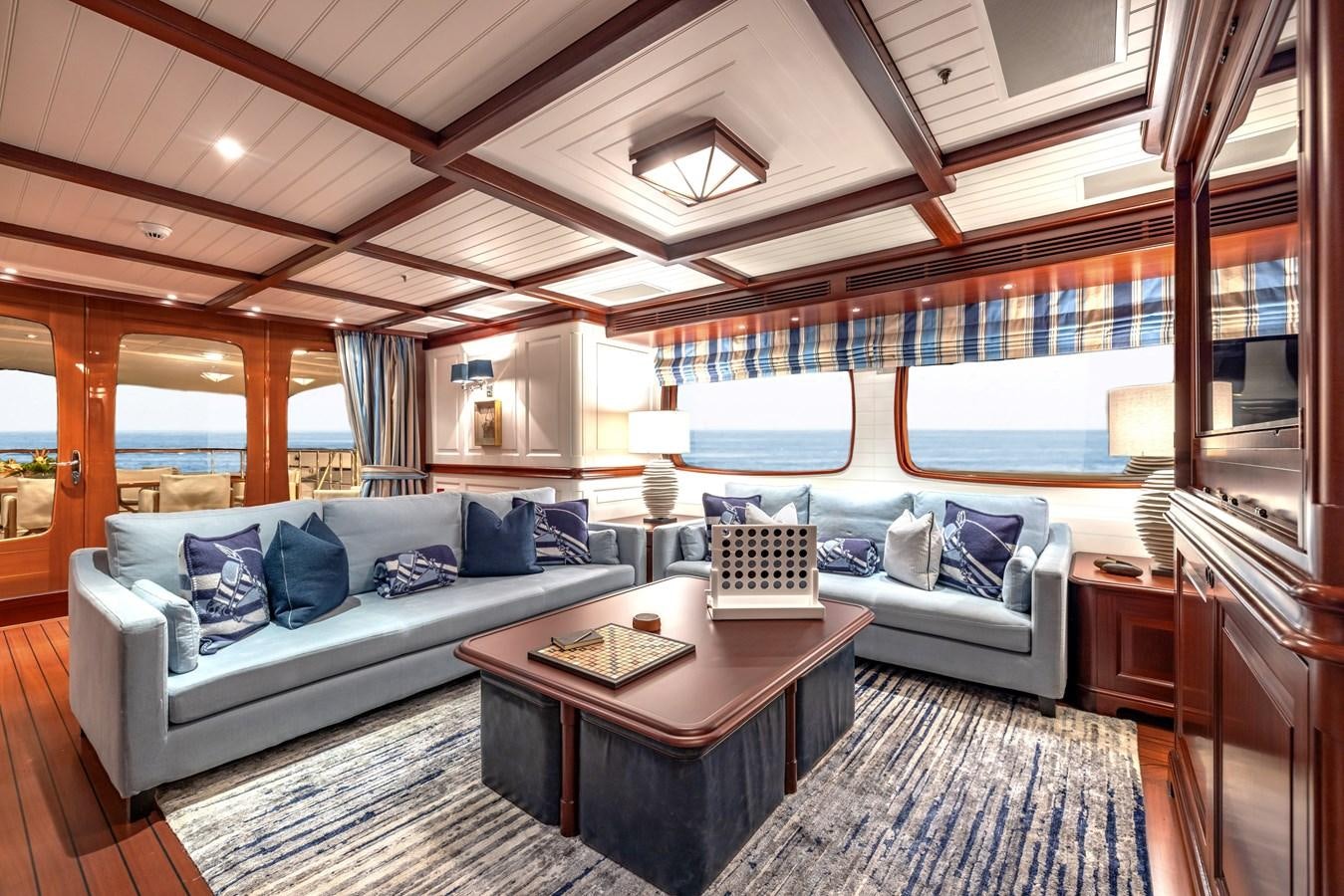 a living room with a large window aboard AWATEA Yacht for Sale