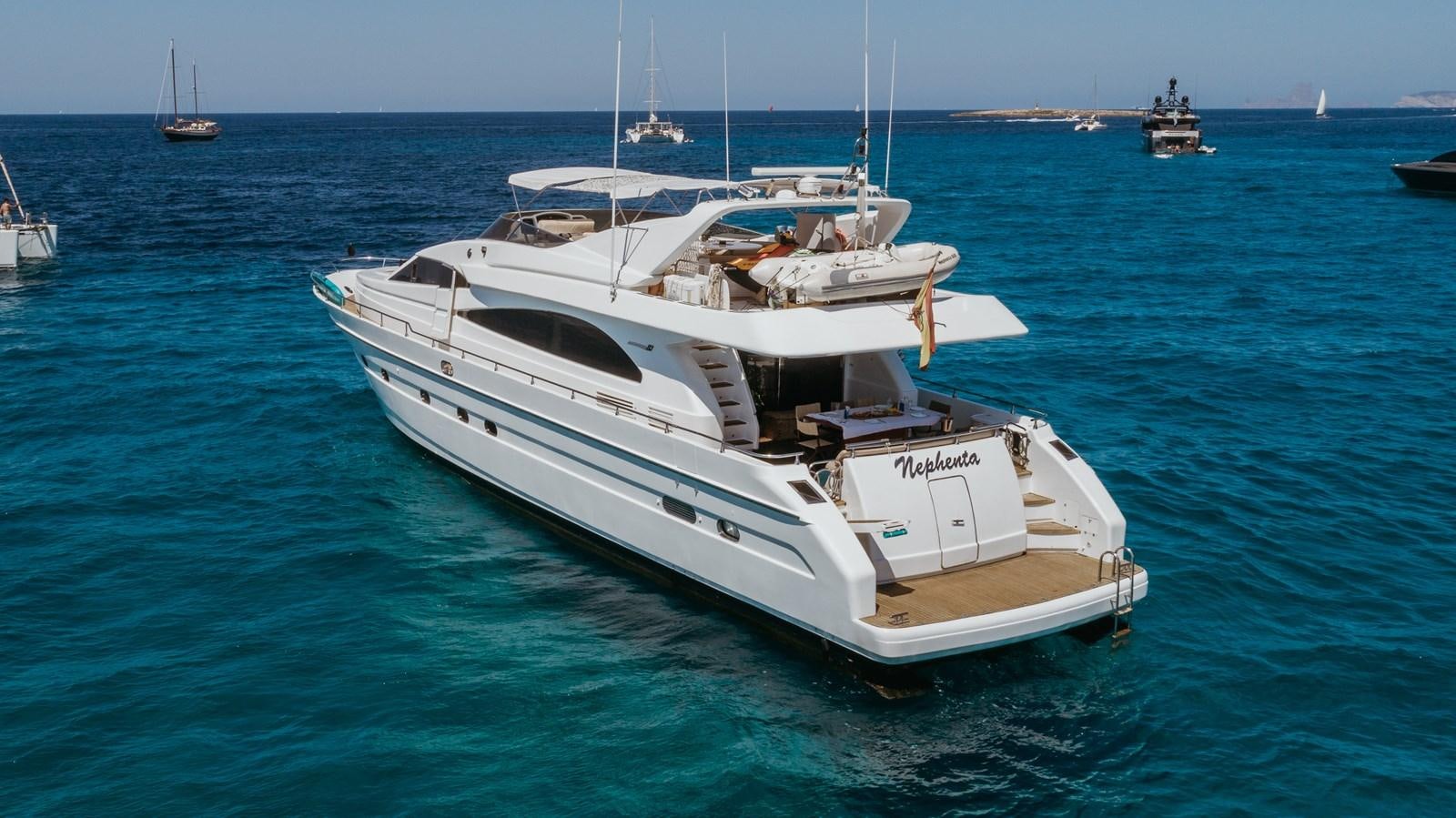 a white boat in the water aboard NEPHENTA Yacht for Sale