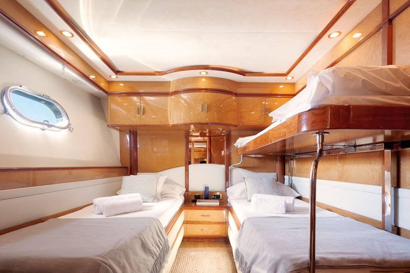 a room with bunk beds aboard NEPHENTA Yacht for Sale
