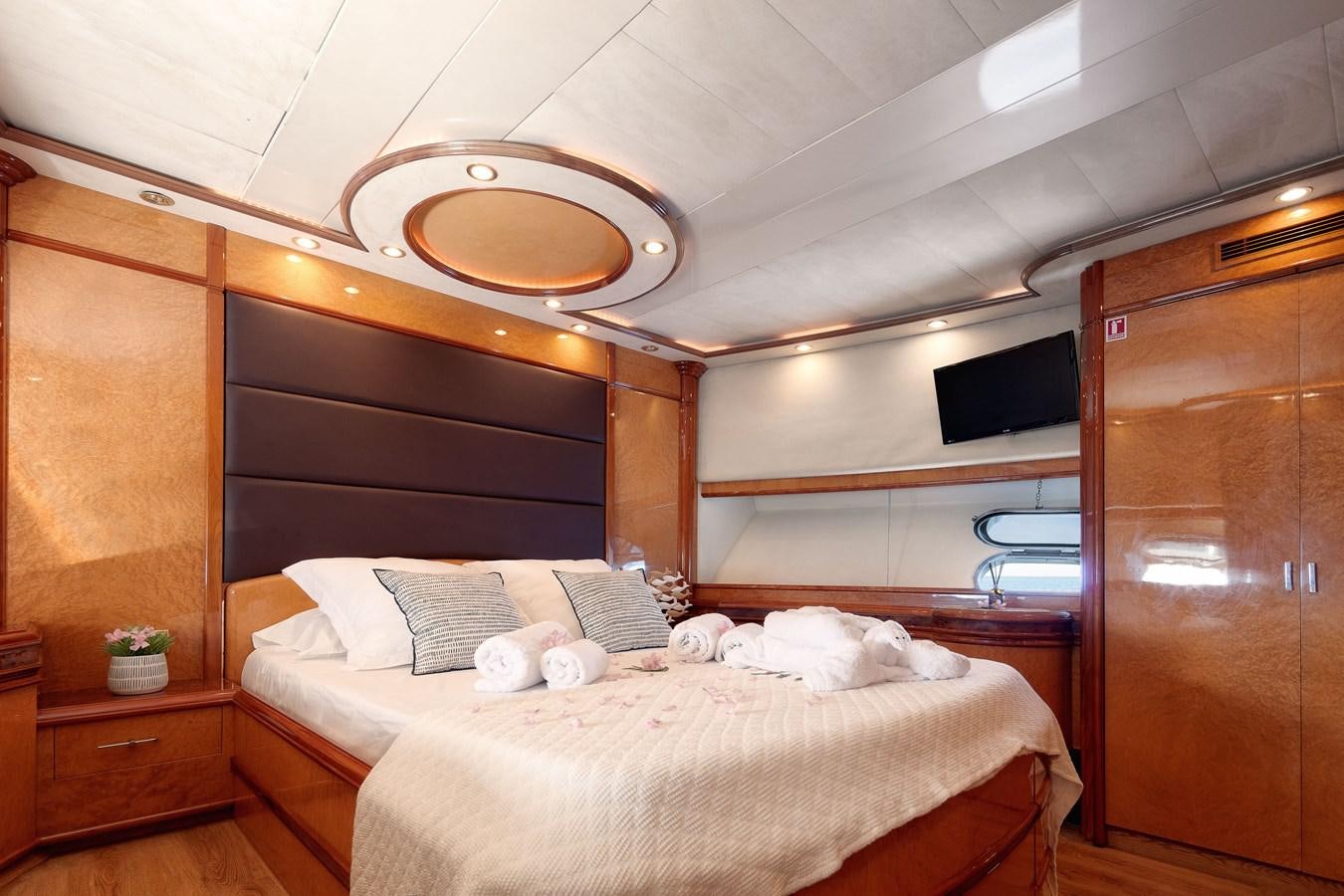 a bed in a cabin aboard NEPHENTA Yacht for Sale