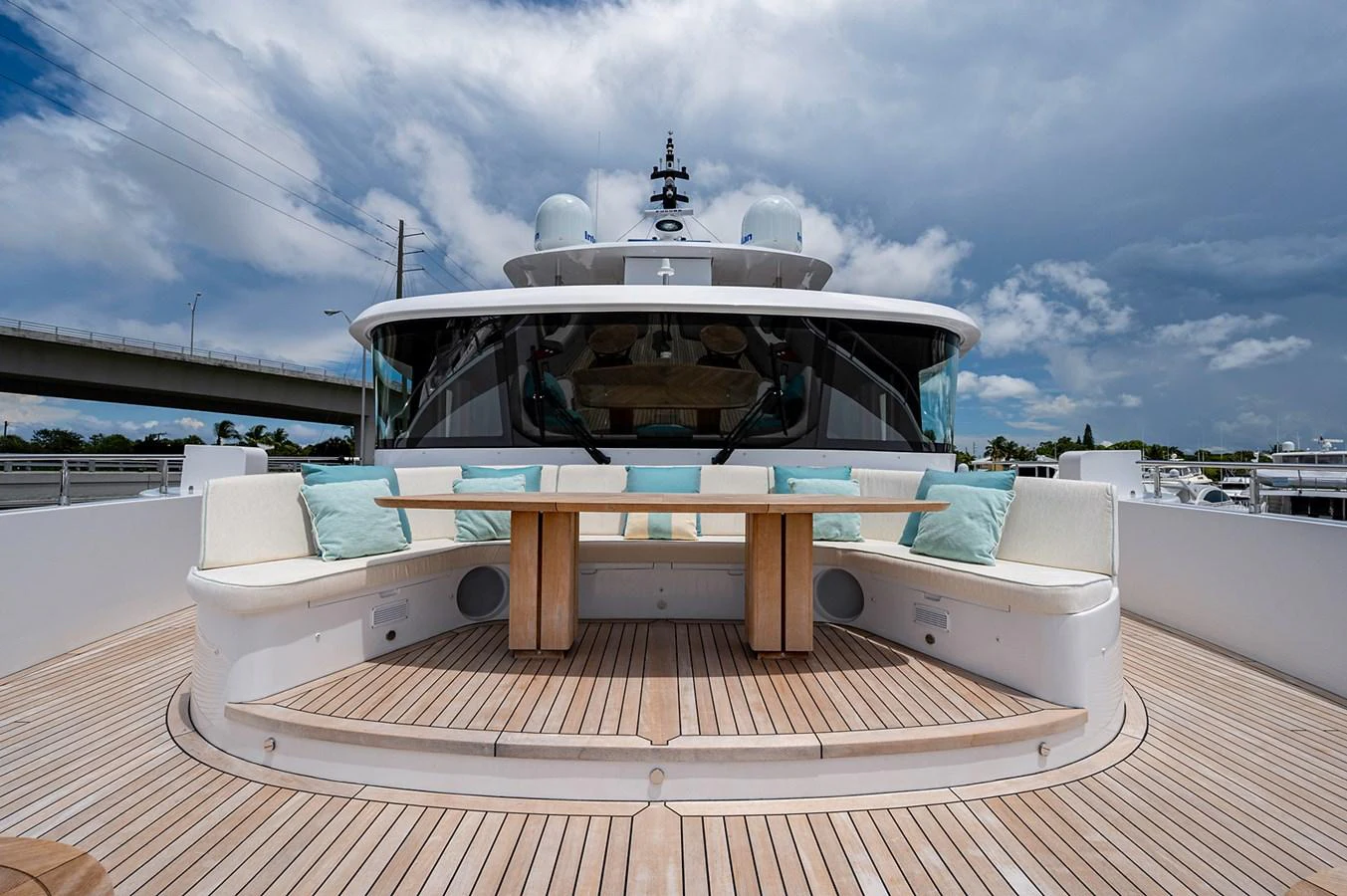 a white couch on a boat aboard CHECKED OUT Yacht for Sale