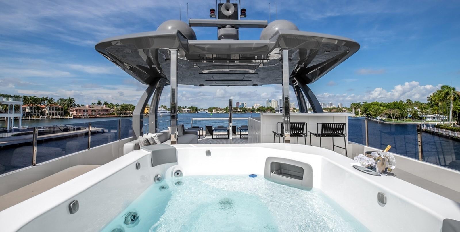 a large white boat on a body of water aboard OCEAN Z Yacht for Sale