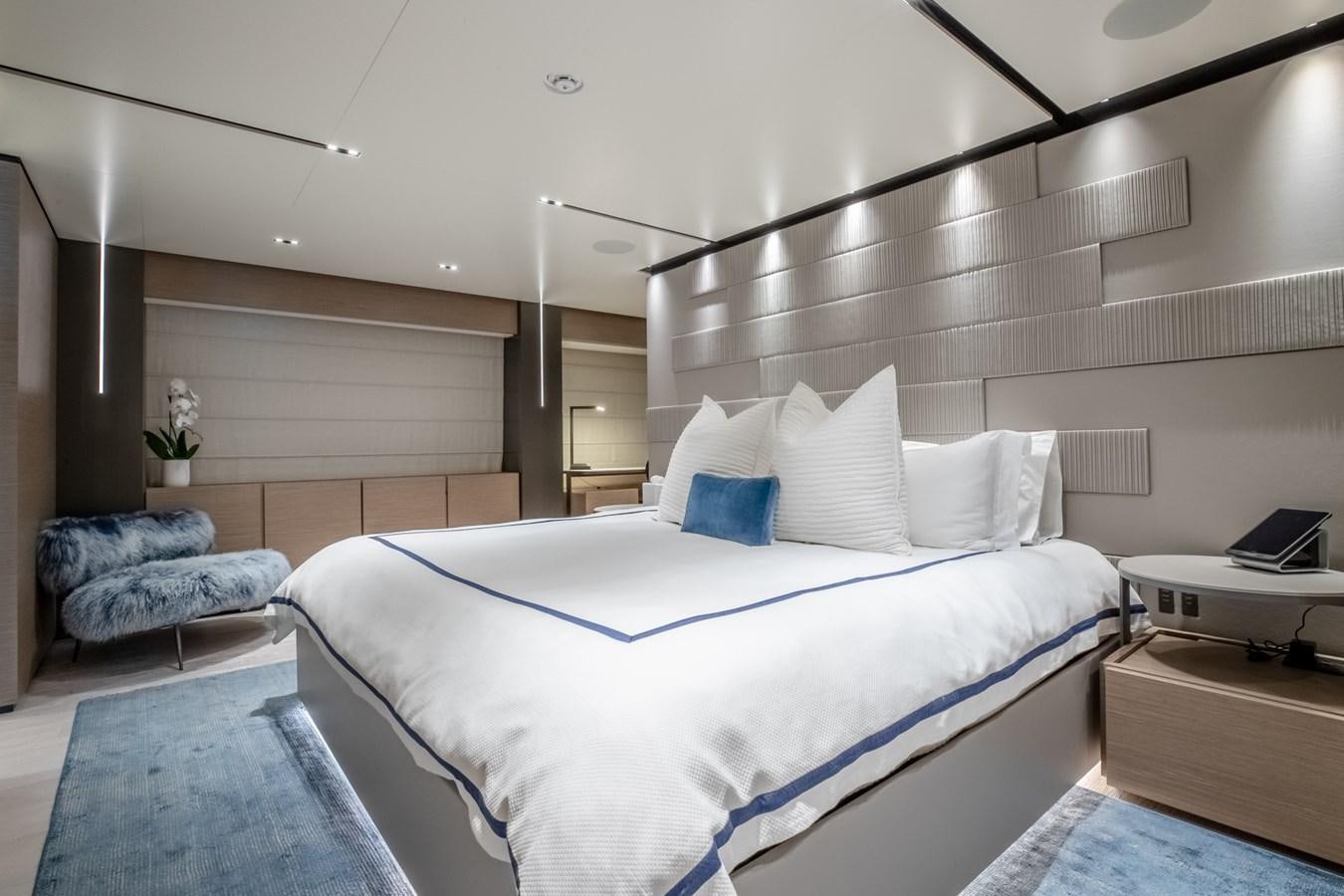 a bedroom with a large bed aboard OCEAN Z Yacht for Sale