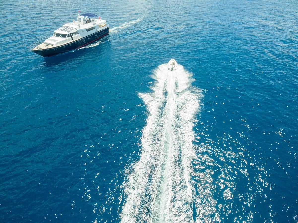 a boat in the water aboard ENIGMA BLUE Yacht for Sale
