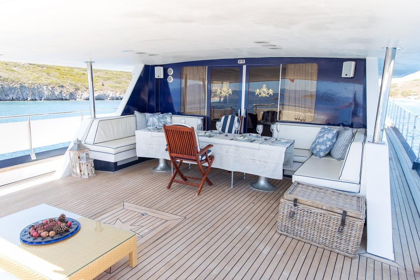 a living room with a large window aboard ENIGMA BLUE Yacht for Sale