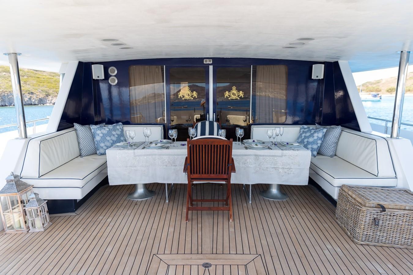 a living room with a large window aboard ENIGMA BLUE Yacht for Sale