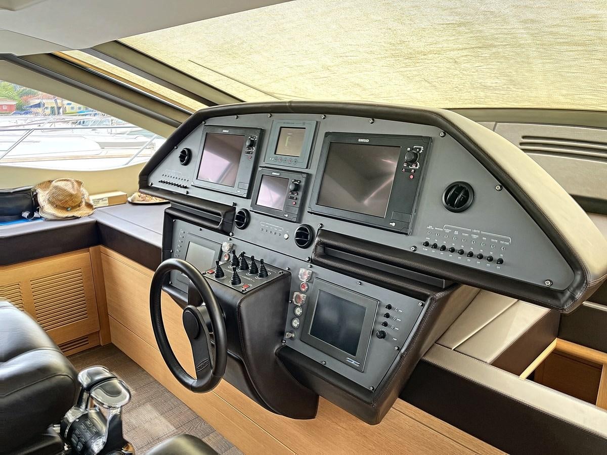 a black and silver video game console aboard X-TREM I Yacht for Sale