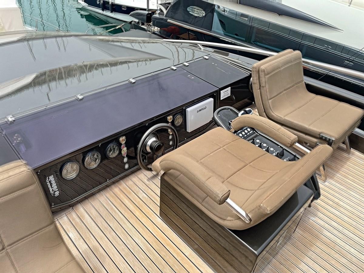 the inside of a car aboard X-TREM I Yacht for Sale