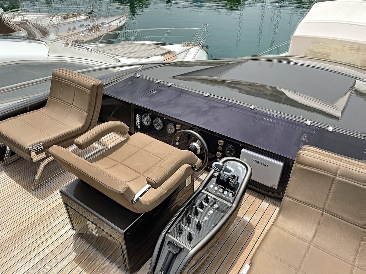 the inside of a car aboard X-TREM I Yacht for Sale