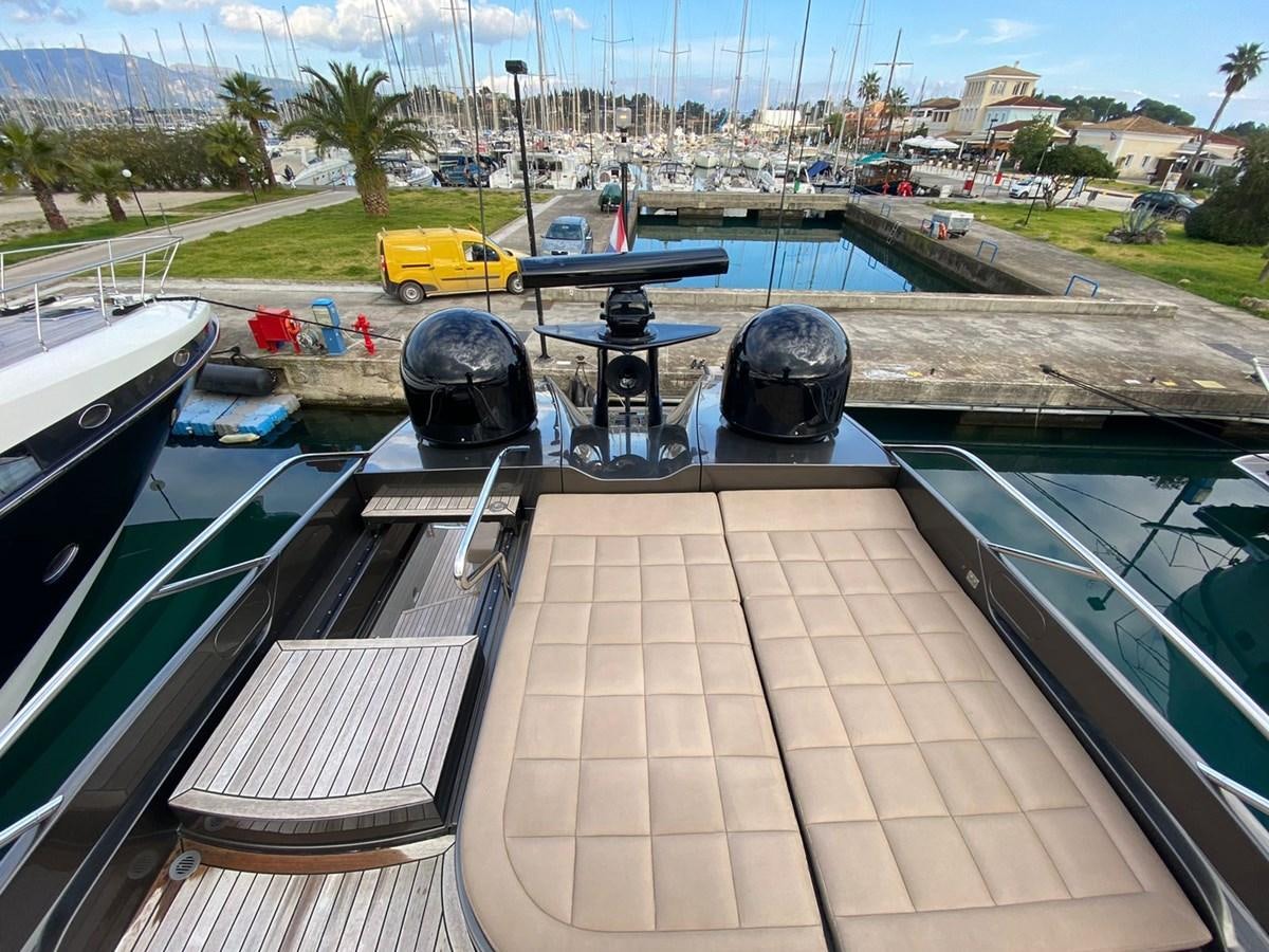a deck with a large black pipe and a black pipe on it aboard X-TREM I Yacht for Sale