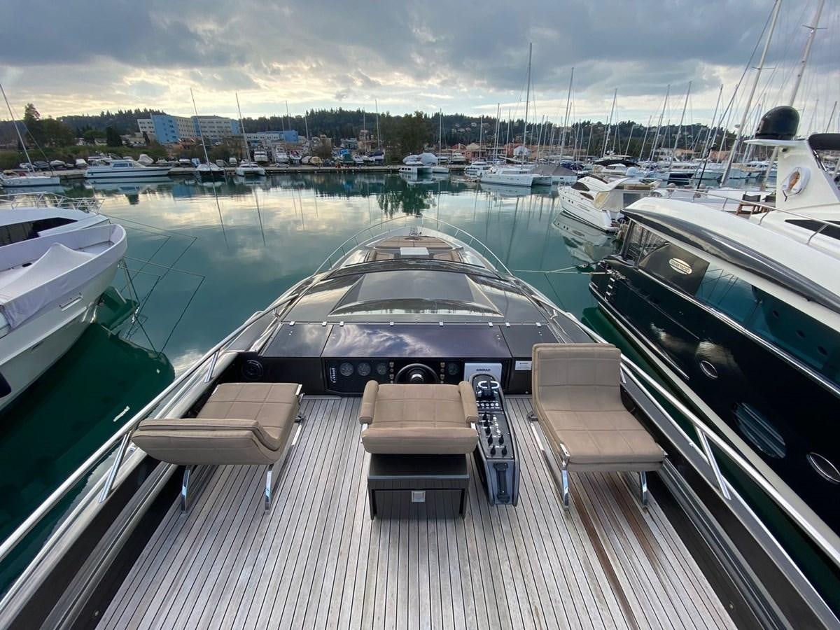 a deck with boats in it aboard X-TREM I Yacht for Sale