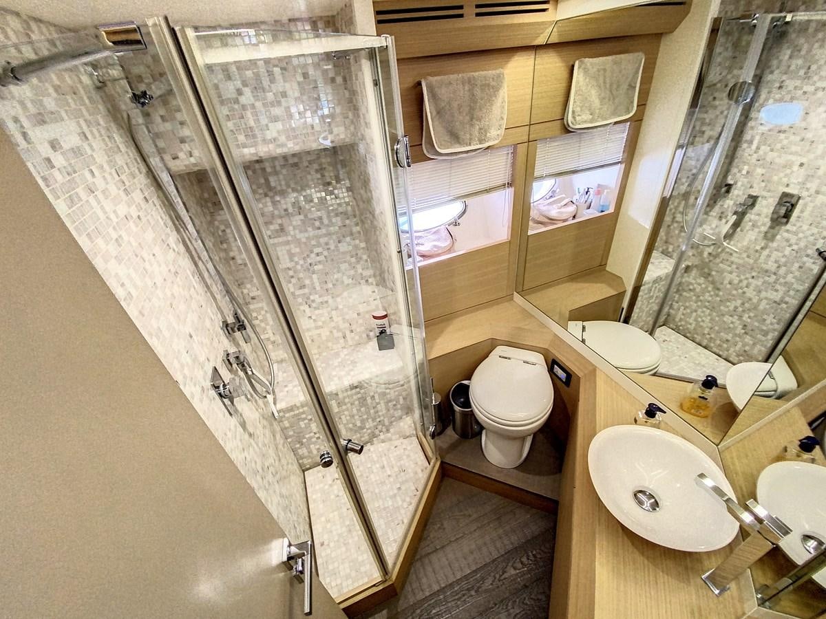 a bathroom with a shower aboard X-TREM I Yacht for Sale
