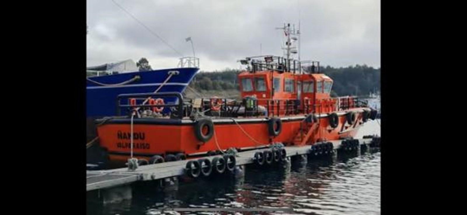 a red and blue boat on water aboard 2005 CUSTOM PILOT BOAT Yacht for Sale