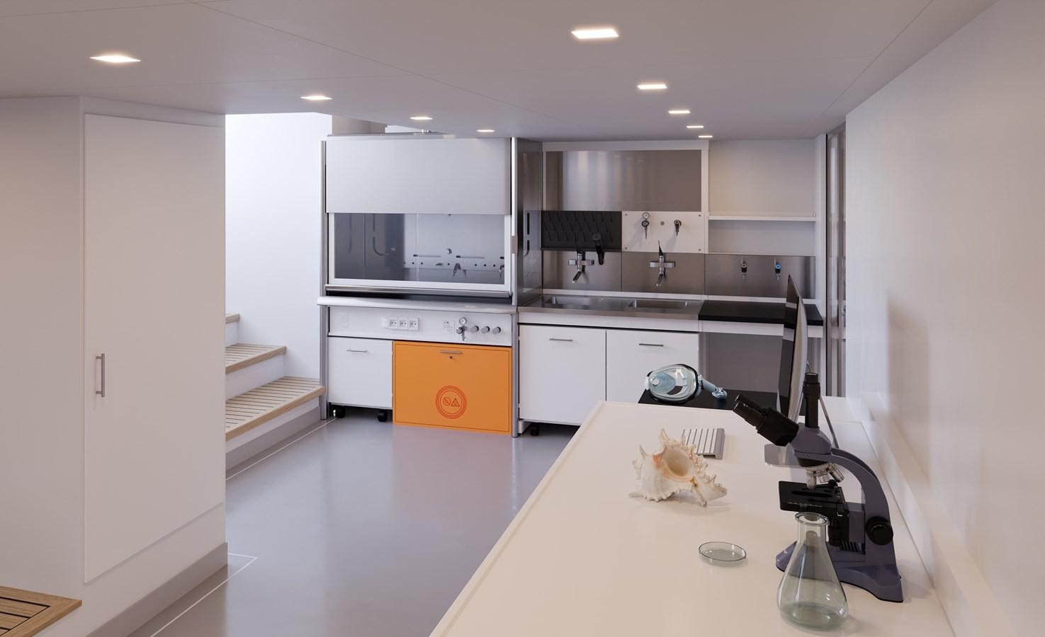 a kitchen with white cabinets aboard SEAXPLORER 60 Yacht for Sale