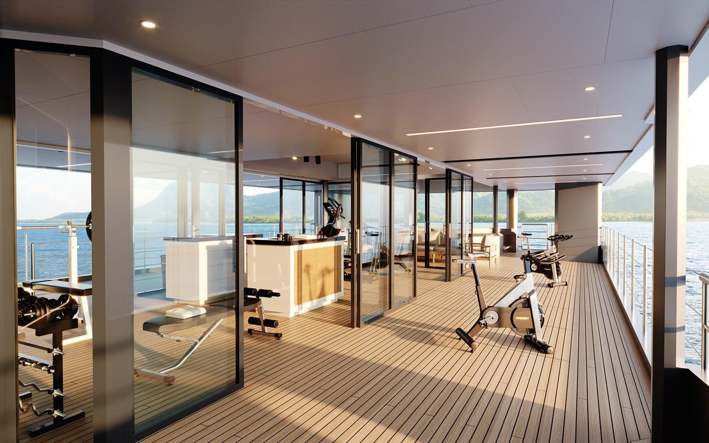 a room with a large window and a wood floor aboard SEAXPLORER 60 Yacht for Sale