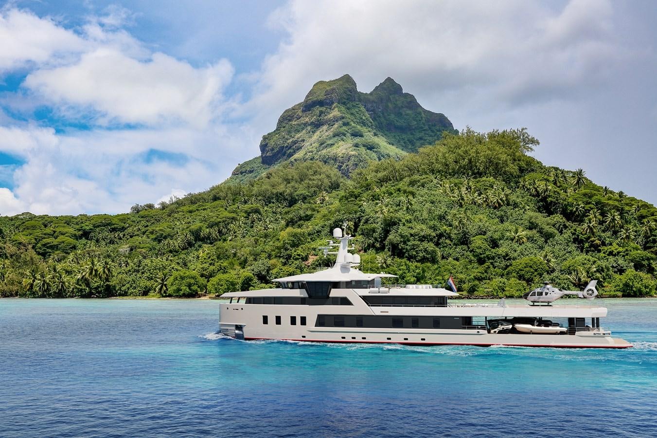 a boat on the water with Bora Bora in the background aboard SEAXPLORER 60 Yacht for Sale