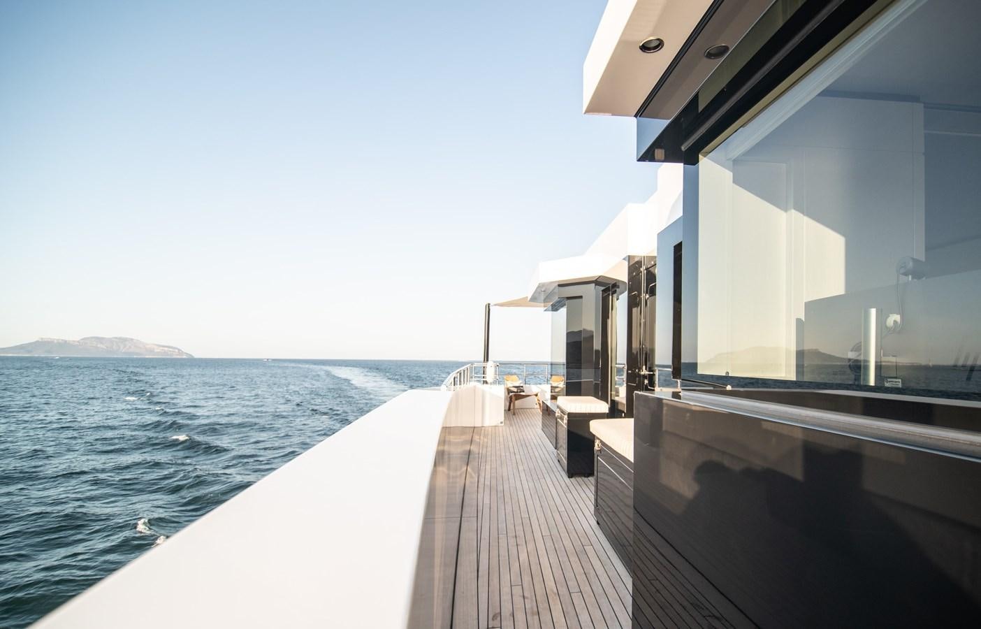 a long dock leading to a building aboard FOX Yacht for Sale