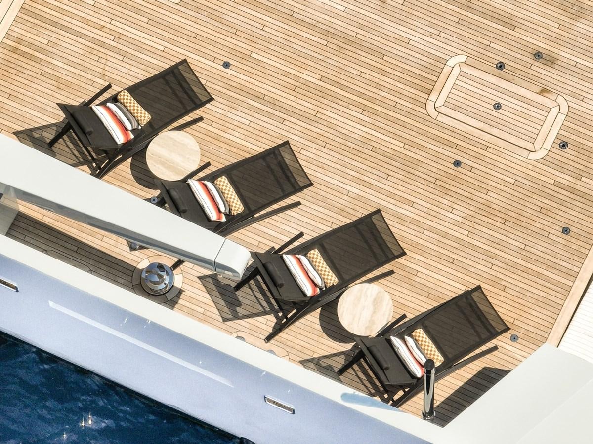 a boat with a few laptops on it aboard FOX Yacht for Sale