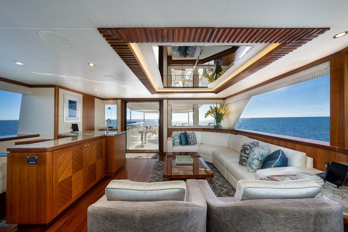 a living room with a large window aboard SEA N SEA Yacht for Charter
