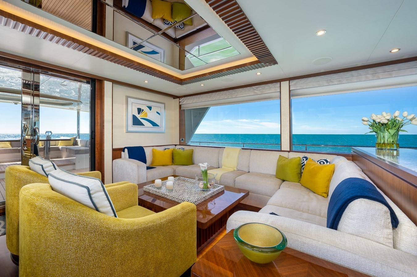 a living room with a large window aboard SEA N SEA Yacht for Sale