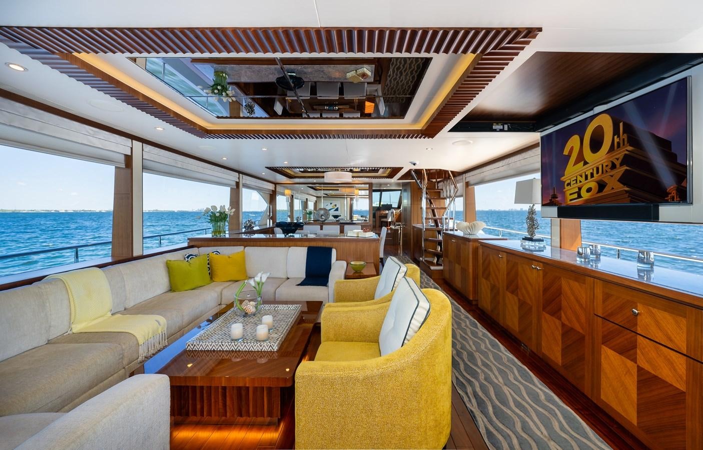 a room with a table and chairs aboard SEA N SEA Yacht for Sale