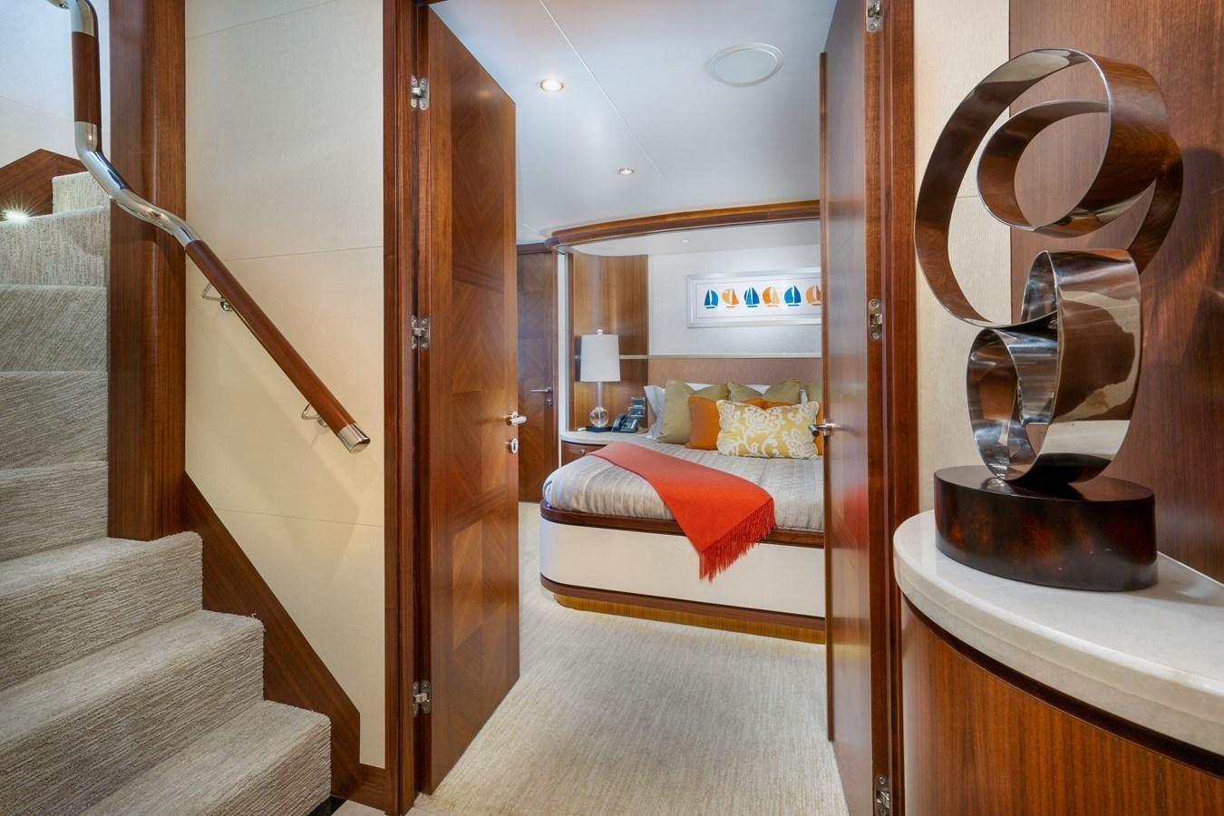 a room with a bed and a mirror aboard SEA N SEA Yacht for Sale