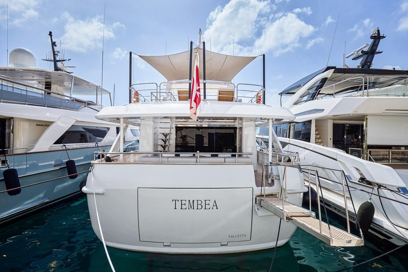 a boat docked at a pier aboard STEEL TRANSATLANTIC NAVETTA 2022 "TEMBEA" Yacht for Sale