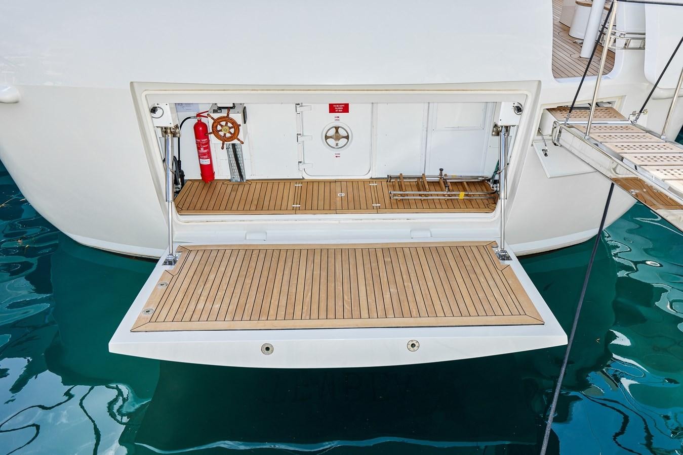 a white machine with red and yellow wires aboard STEEL TRANSATLANTIC NAVETTA 2022 "TEMBEA" Yacht for Sale