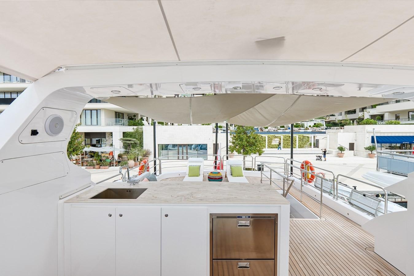 a large white building with a large white awning and a large white ceiling aboard STEEL TRANSATLANTIC NAVETTA 2022 "TEMBEA" Yacht for Sale