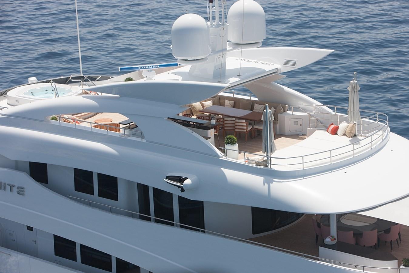 a white boat in the water aboard DAISY D Yacht for Sale