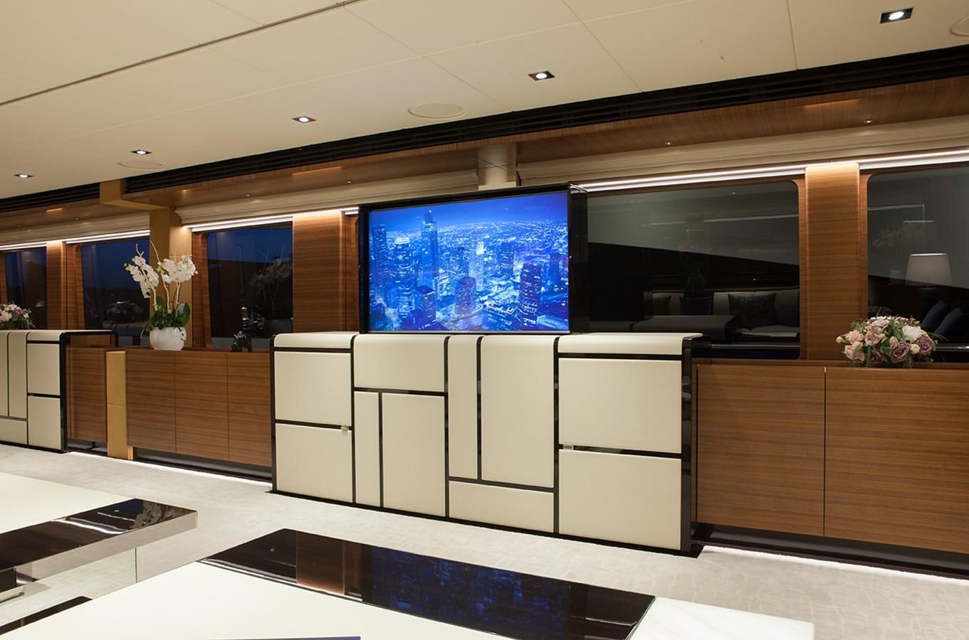 a room with a large glass wall aboard DAISY D Yacht for Sale