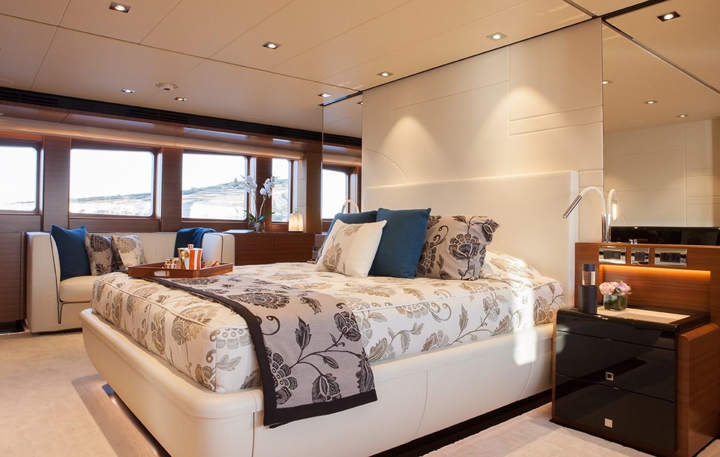 a bed in a room aboard DAISY D Yacht for Sale