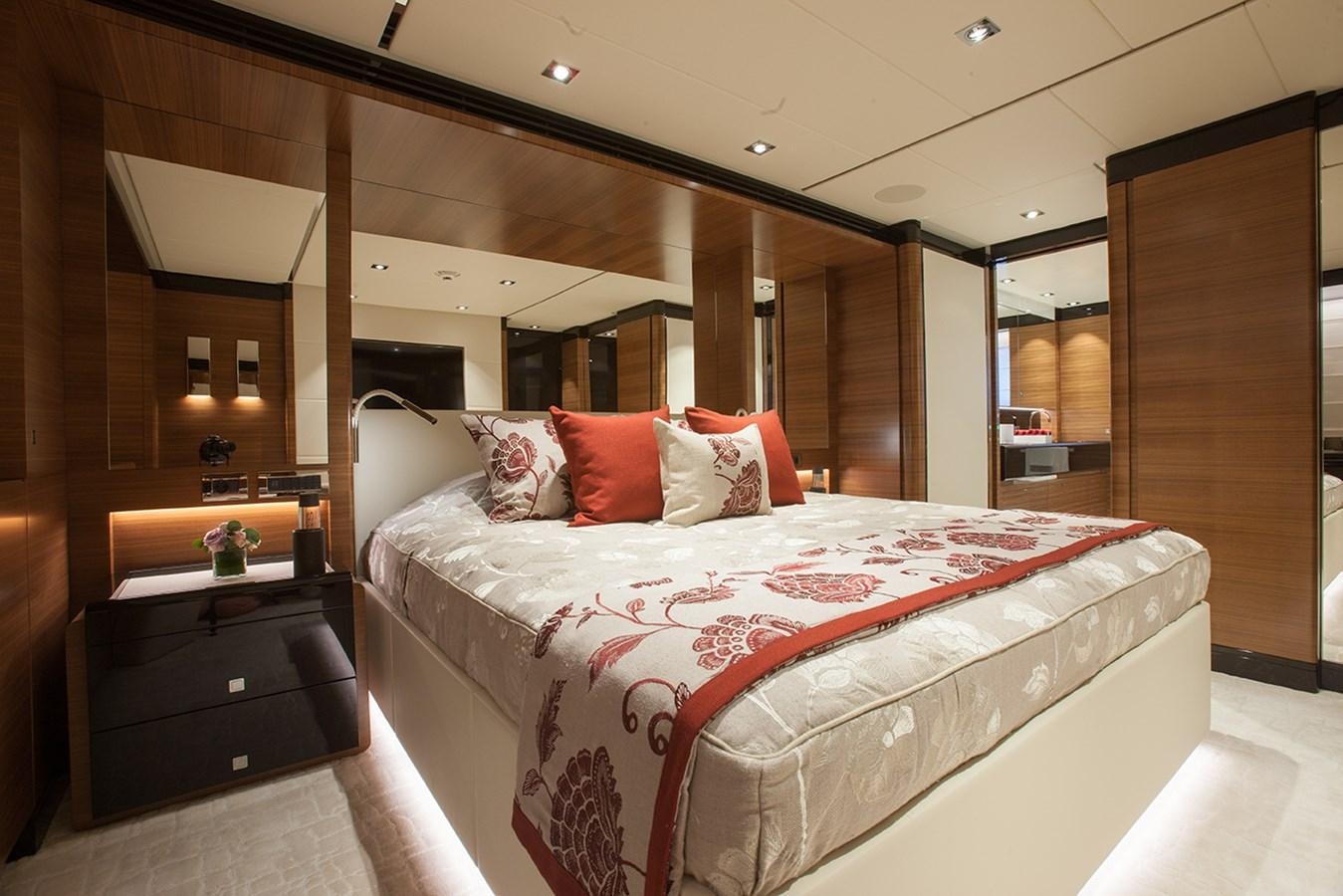 a bed in a room aboard DAISY D Yacht for Sale