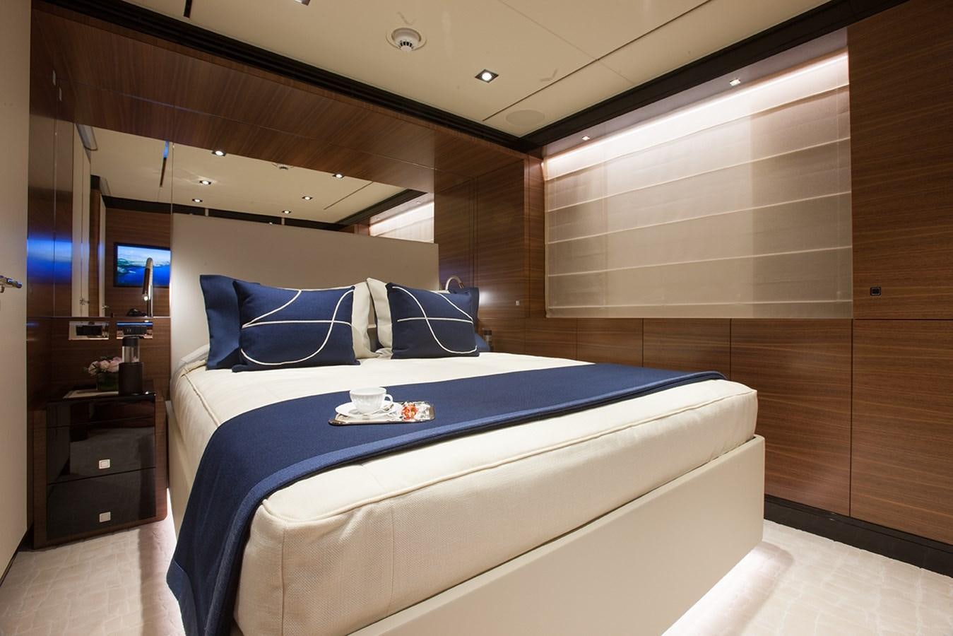 a bed in a room aboard DAISY D Yacht for Sale