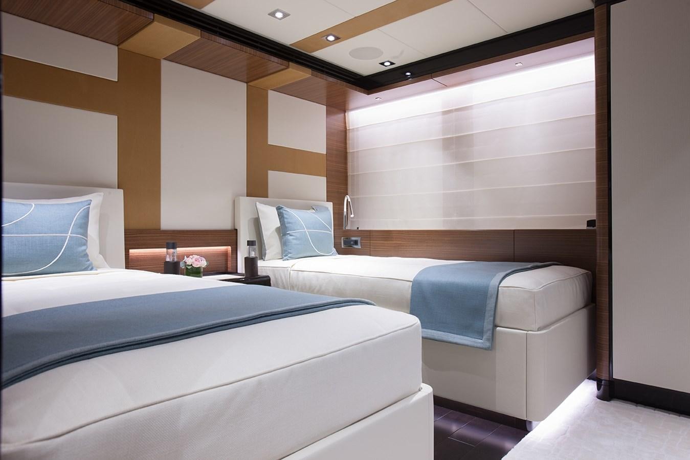 a room with two beds aboard DAISY D Yacht for Sale