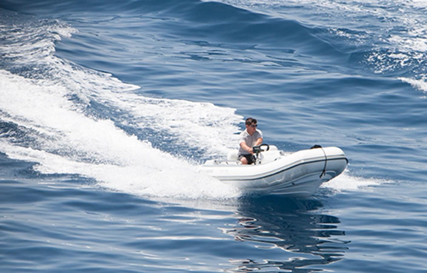 a person on a jet ski aboard DAISY D Yacht for Sale