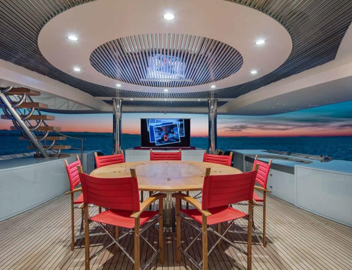 a room with a table and chairs aboard EUPHORIA II Yacht for Sale