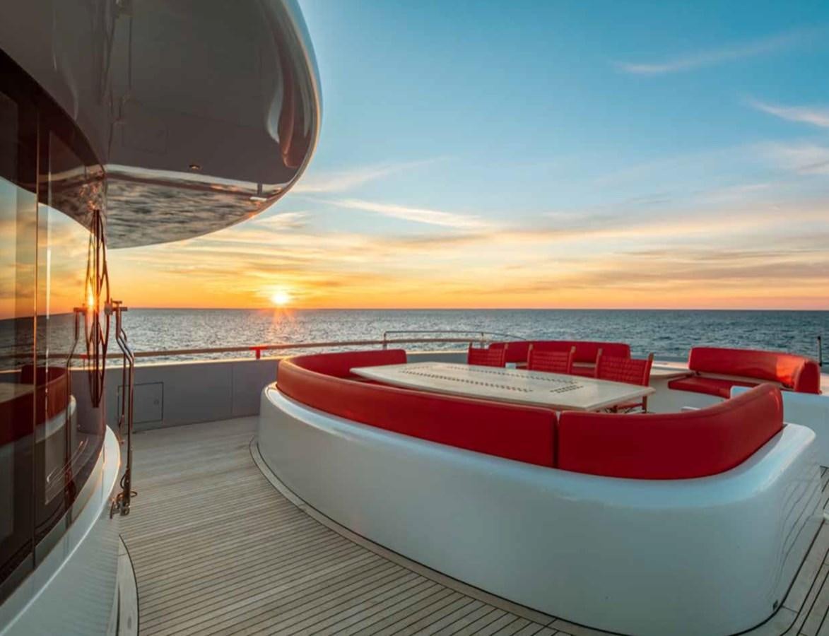 a boat on a deck overlooking the ocean aboard EUPHORIA II Yacht for Sale