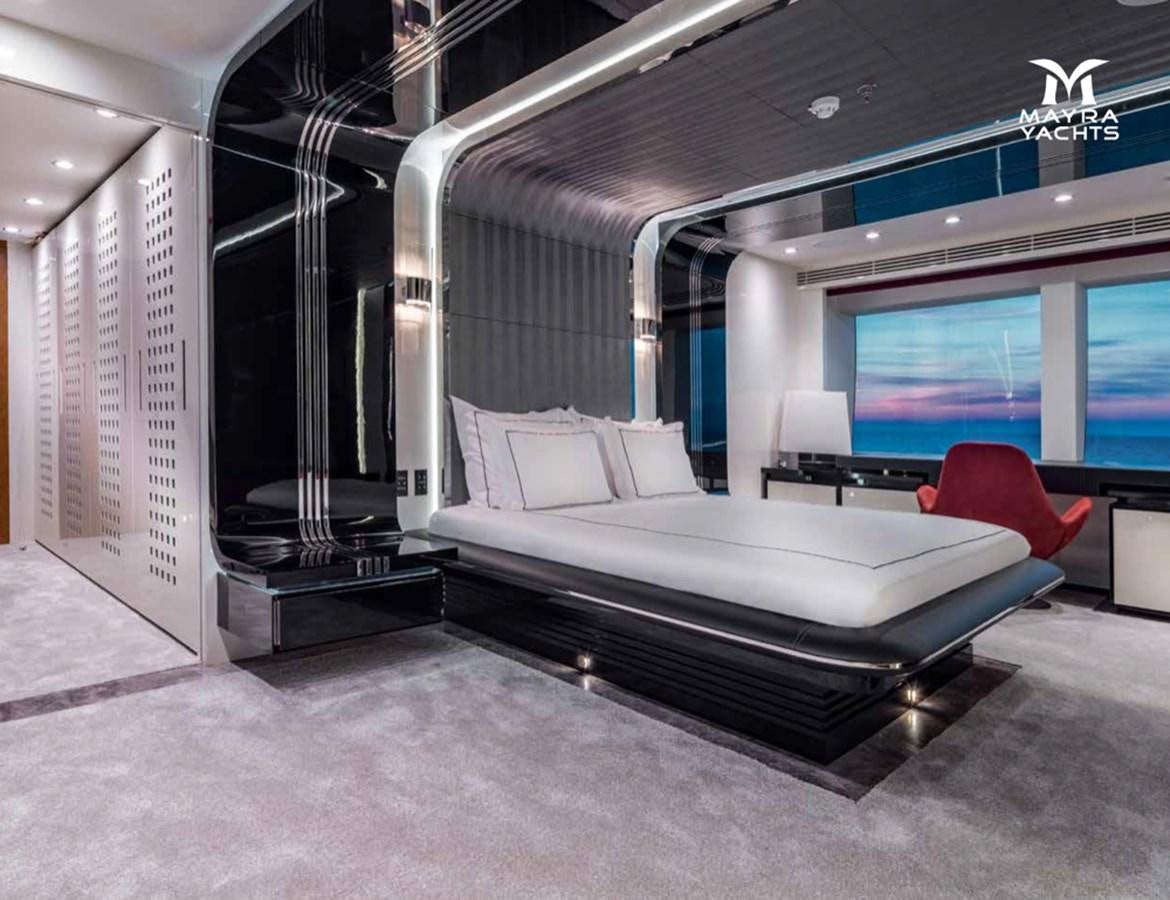 a large bed in a room aboard EUPHORIA II Yacht for Sale