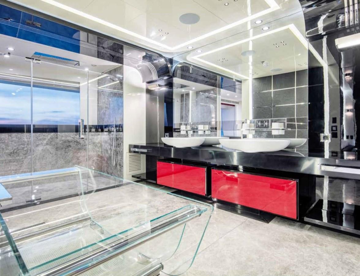 a large kitchen with a glass wall aboard EUPHORIA II Yacht for Sale