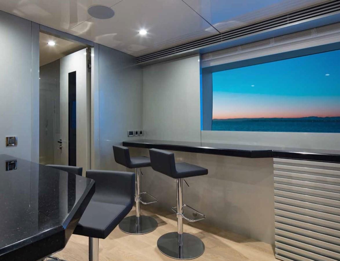 a room with a table and chairs aboard EUPHORIA II Yacht for Sale