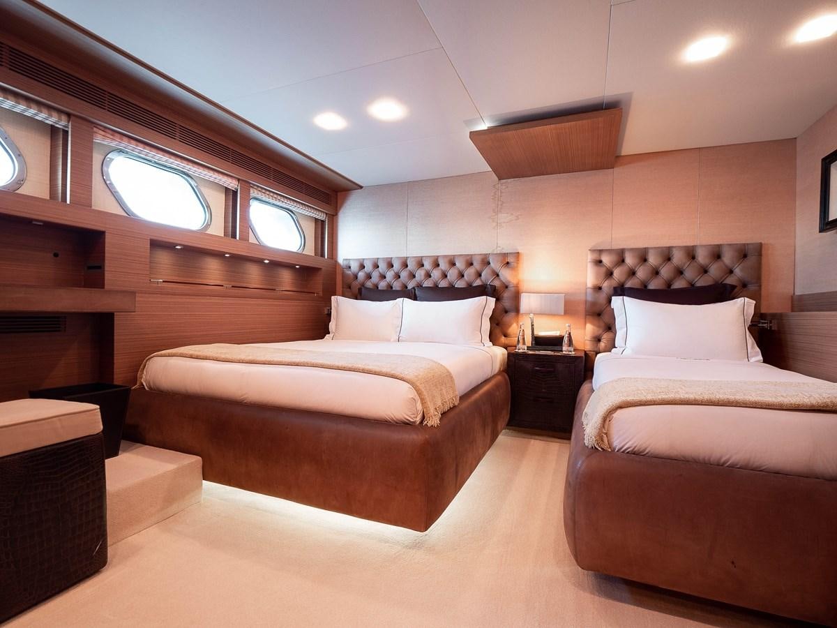 a room with two beds aboard NAMASTE 8 Yacht for Sale