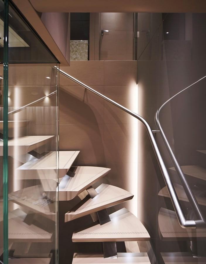 a set of wooden stairs aboard SP1 Yacht for Sale