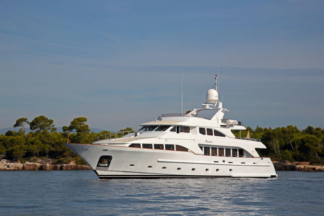 a white yacht on the water aboard INOUIS Yacht for Sale