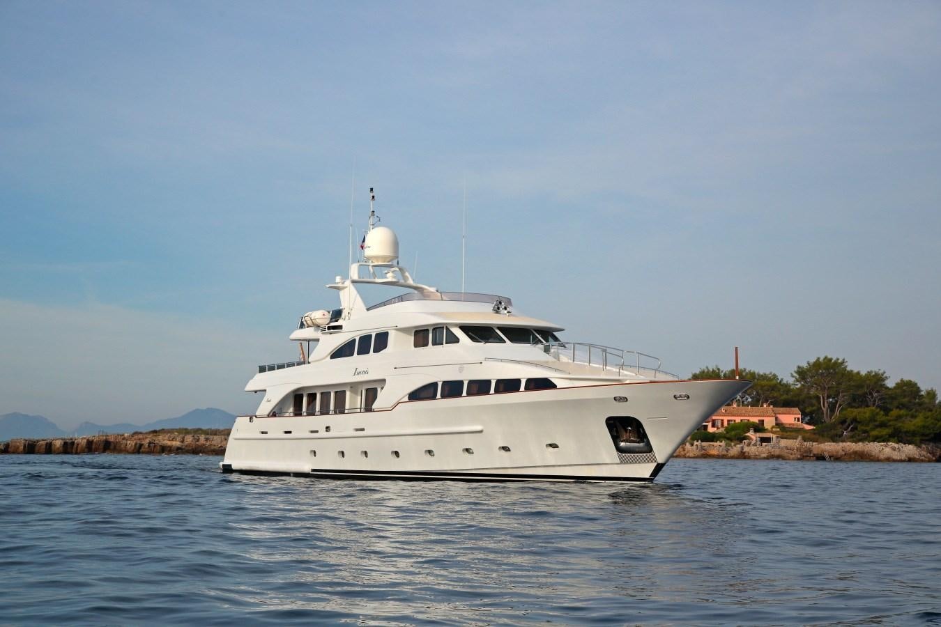 a white yacht on the water aboard INOUIS Yacht for Sale